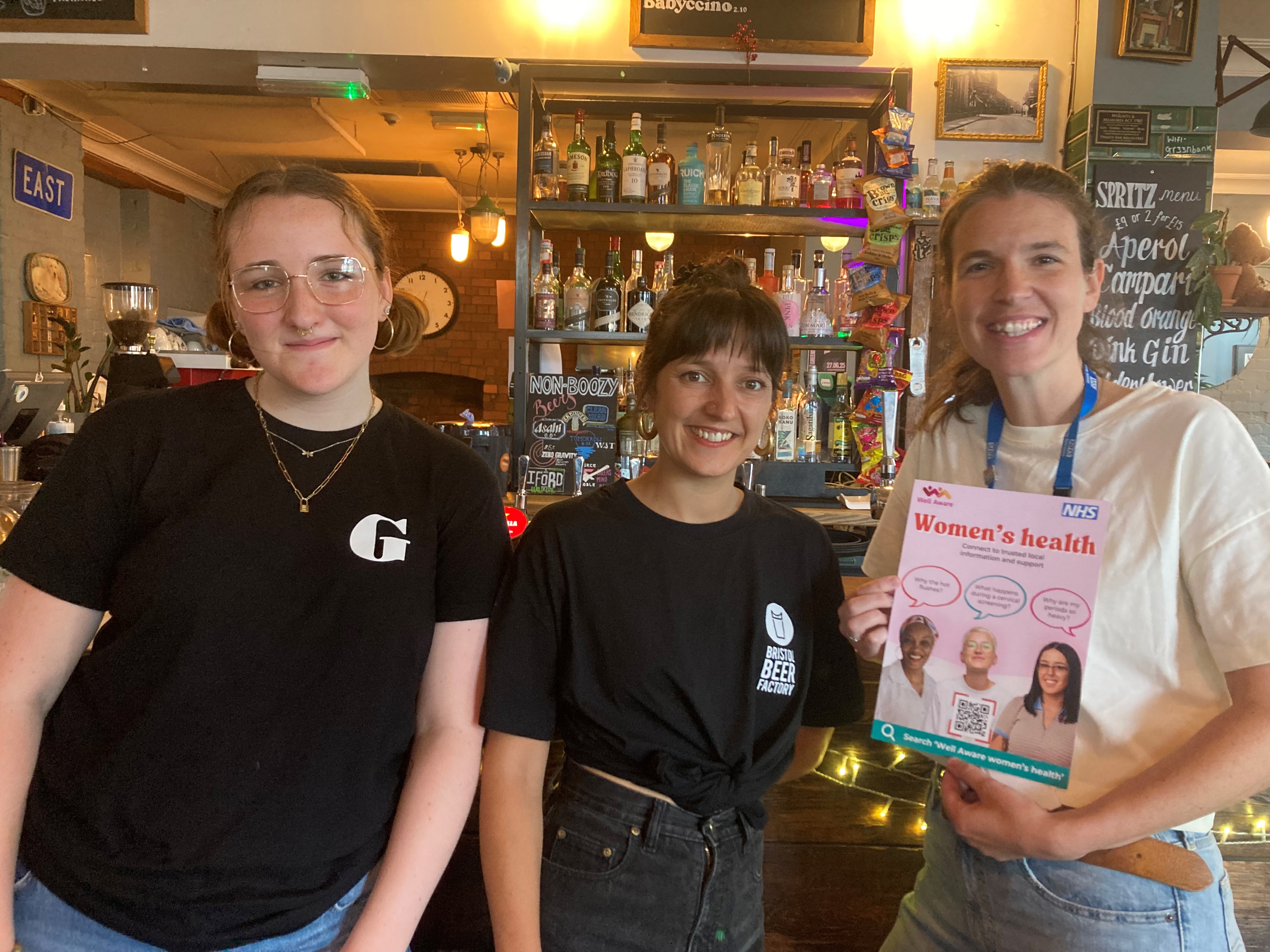 Zazu's Pubs The Greenbank staff Eve and Jasmine with Dr Katherine Kearley-Shiers.