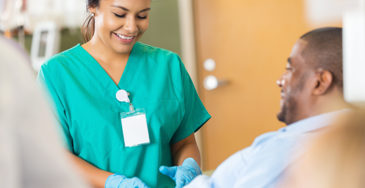 Hospital phlebotomist taking a blood sample from a patient