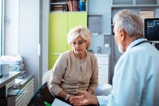 Close up of a senior woman having an appointment at the doctor's office.